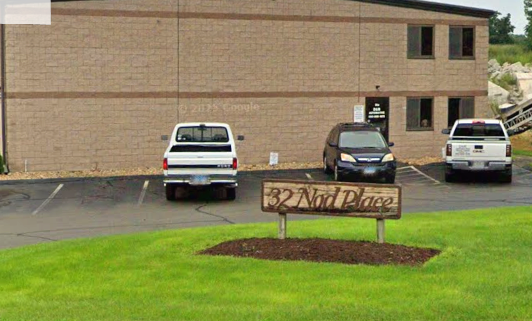 32 Nod Place sign outside the D&R Automotive building